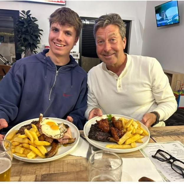 John Torode and his son Jonah enjoying a meal together.