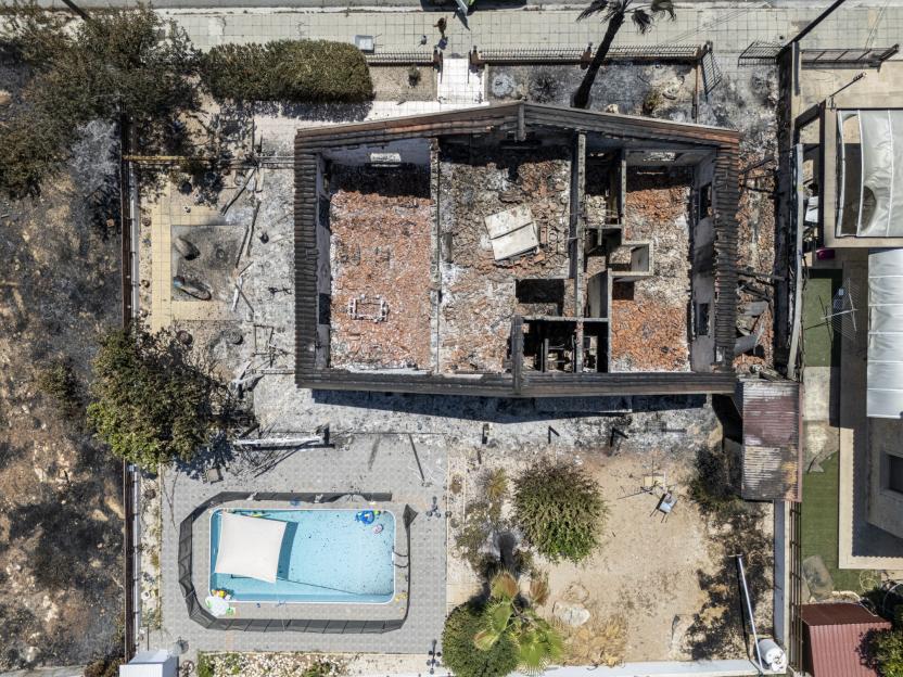 INFERNOS AFTERMATH Moment horrified Brit expats tour smouldering shell of Cyprus home they fled with secs to spare as deadly wildfires hit