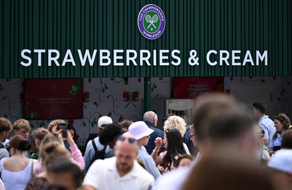 Crowd queuing for strawberries and cream at Wimbledon.
