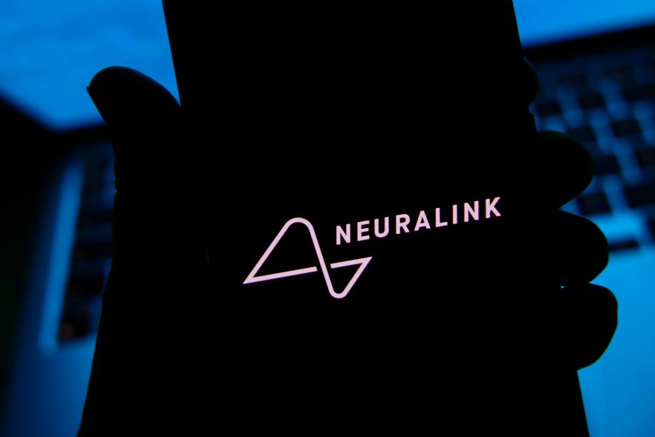 Neuralink logo on a phone screen.
