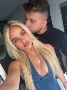 Woman and man embracing.