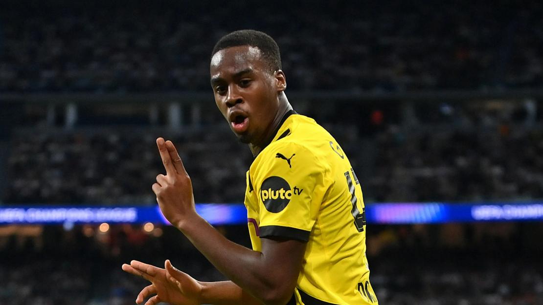 Jamie Bynoe-Gittens of Borussia Dortmund celebrating a goal.