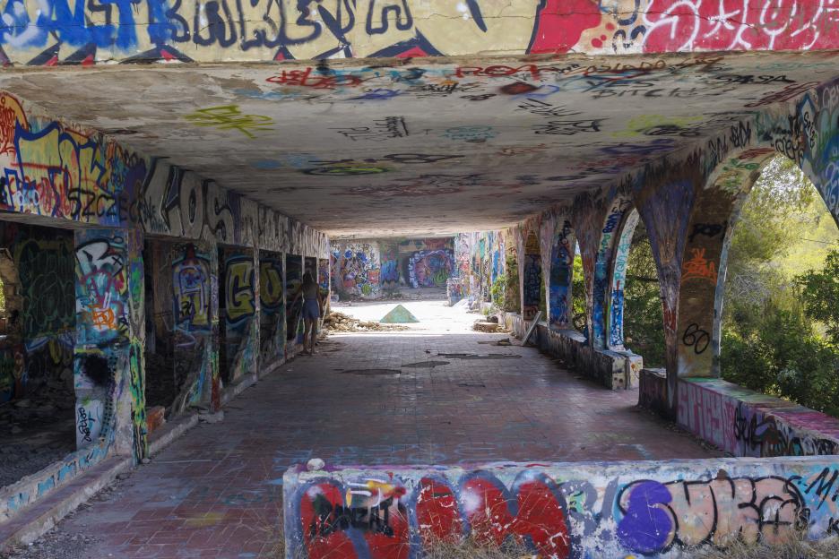 Graffiti-covered ruins of a former Ibiza superclub.