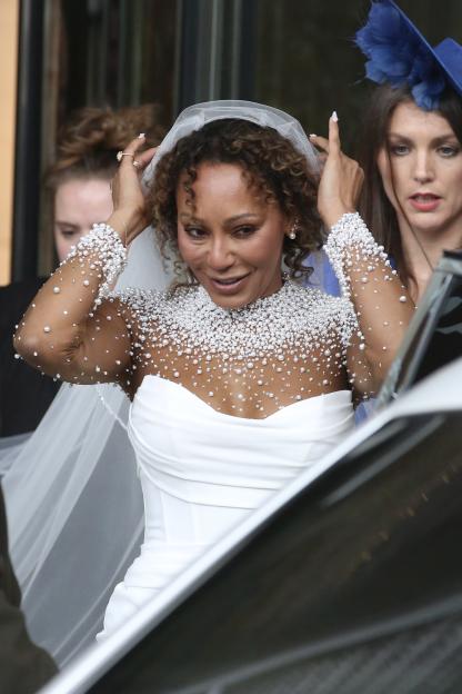 Mel B in a pearl-embellished wedding dress.