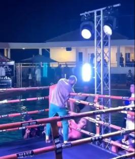 Boxer knocked unconscious in a boxing ring.
