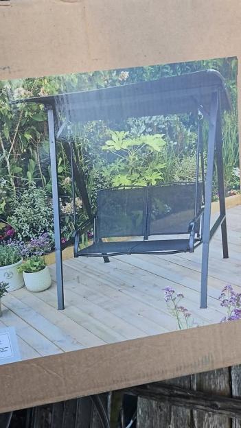 Two-person garden swing with canopy.