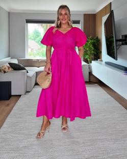 Woman in a pink dress.