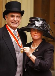 Sir Trevor Brooking and his wife at Buckingham Palace after he received his knighthood.