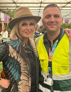 Photo of a woman and a paramedic.