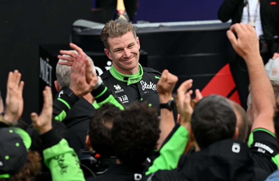 Nico Hulkenberg celebrating a third-place finish at the Formula 1 British Grand Prix.