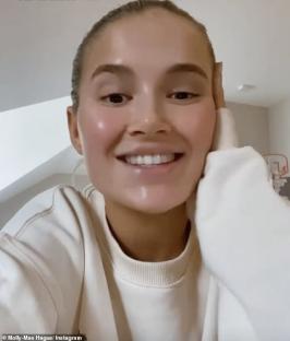 Molly-Mae Hague in a video asking fans to wait before getting cosmetic enhancements.
