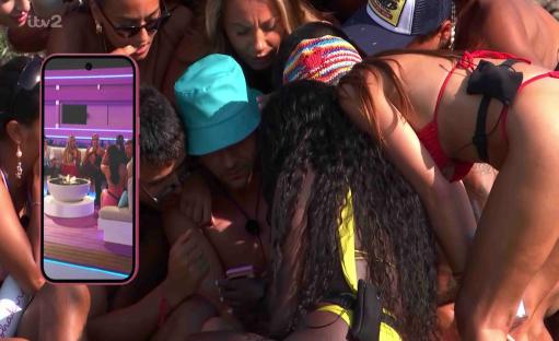 Islanders watching a video on a phone.