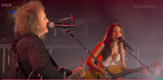 Olivia Rodrigo and Robert Smith performing a duet at Glastonbury.