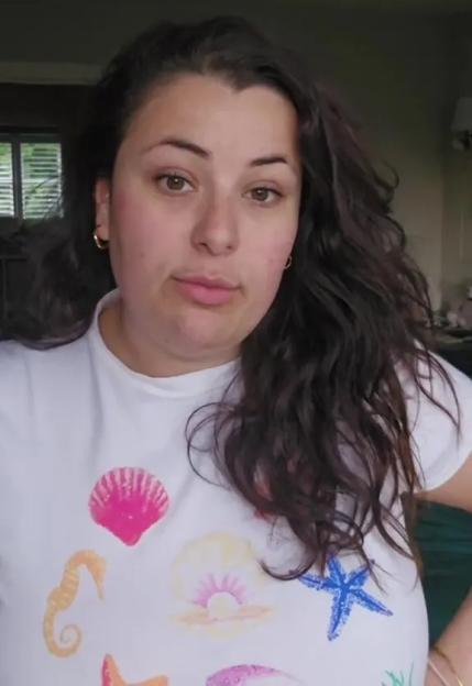 Woman wearing a seashell-themed shirt discusses Mounjaro weight loss.
