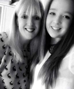 Black and white photo of a mother and daughter.
