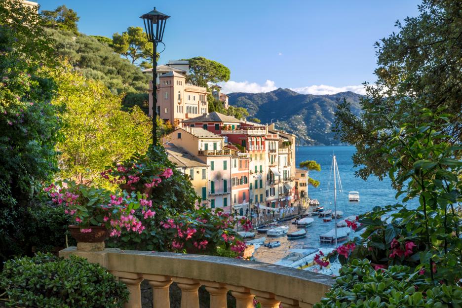 Portofino harbor view with colorful buildings and boats.