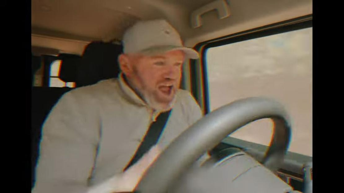 Man shouting while driving.