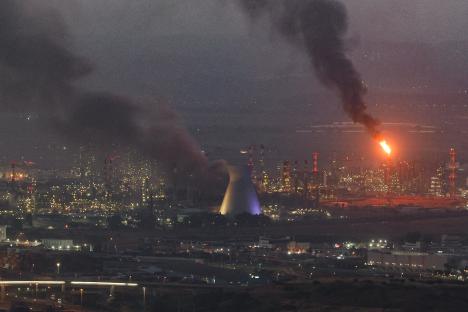 Smoke billows from a site in Haifa following an Iranian missile barrage.