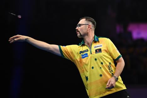 Damon Heta of Australia throwing a dart.