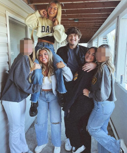 Group of friends posing for a photo.