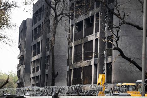 Fire-damaged buildings in Ahmedabad, India.