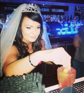 Bride-to-be making a cocktail.