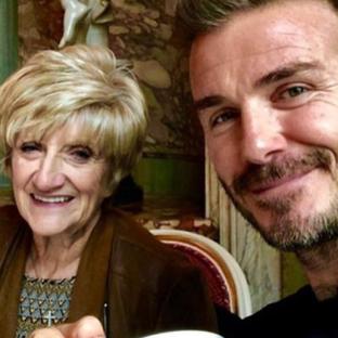 David Beckham with his mother.