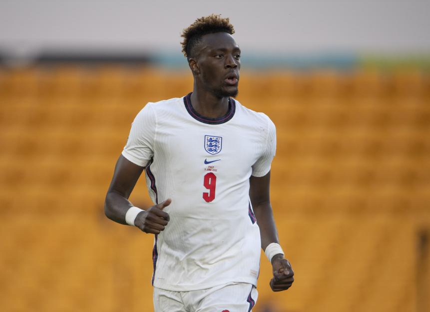 Tammy Abraham, wearing an England soccer uniform, during a game.