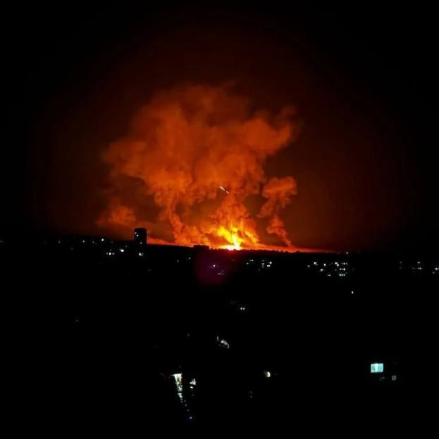 Kharkiv city engulfed in flames from bombing.