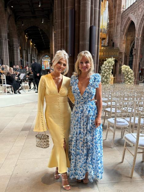 Lucy Fallon and Tina O'Brien at a wedding.