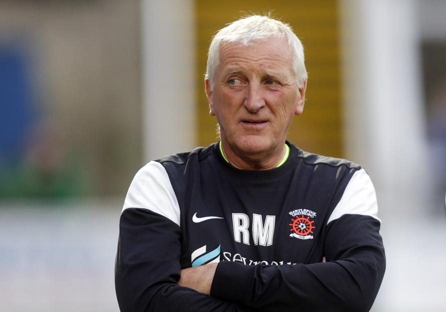 Ronnie Moore, Hartlepool United manager, with arms crossed.