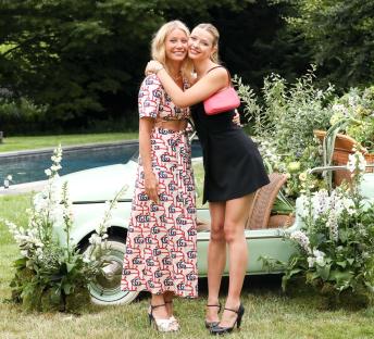 Gwyneth Paltrow and Apple Martin hugging.