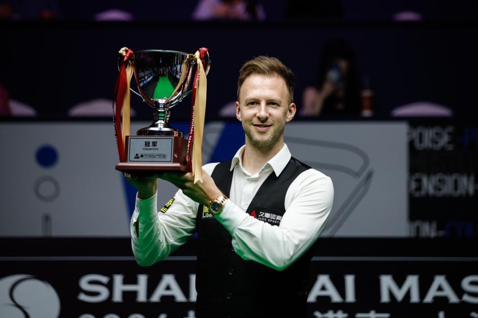 Judd Trump of England holding the Shanghai Masters trophy.