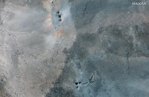 Satellite image of craters at the Fordow Fuel Enrichment Plant after US airstrikes.