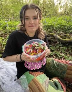 Photo of Emily Stokes, 17, holding a bowl of candy.