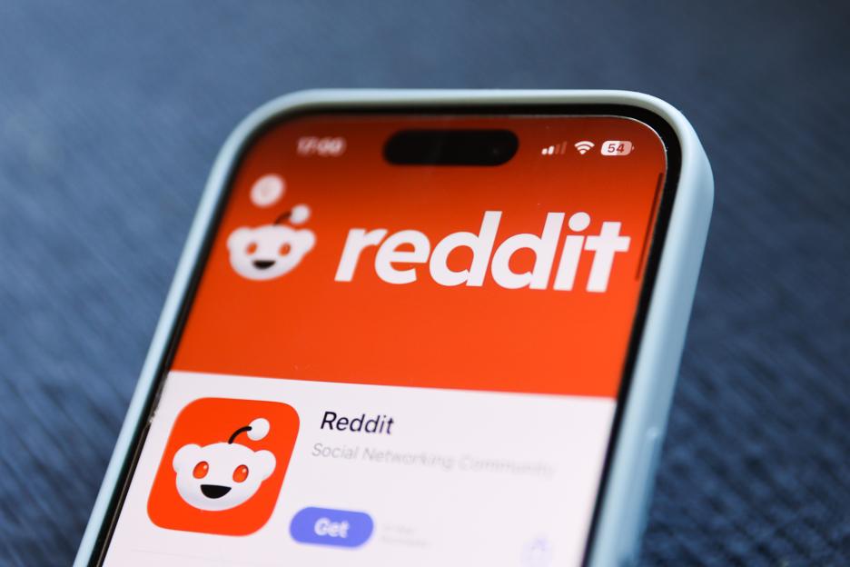 Smartphone displaying the Reddit app on the App Store.