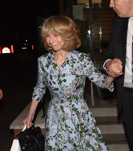 Helen Worth leaving a party.