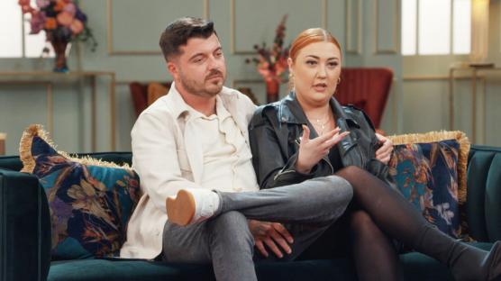 Jay Howard and Luke from Married at First Sight sitting on a couch.