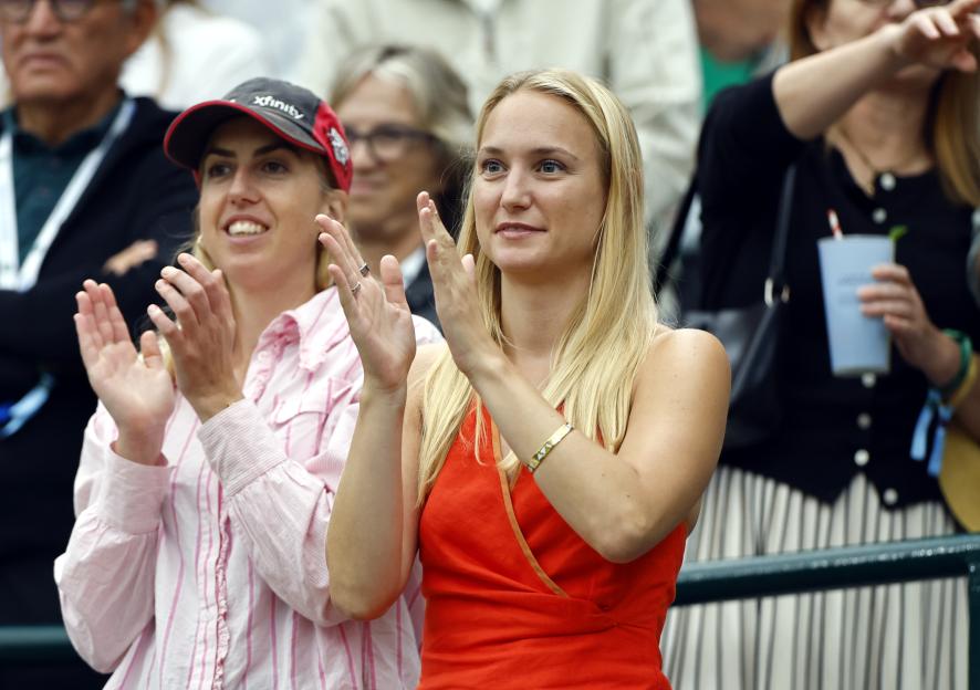 Cameron Norrie's girlfriend applauding at Wimbledon.