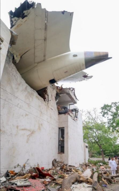 Photo of a plane crash into a building.