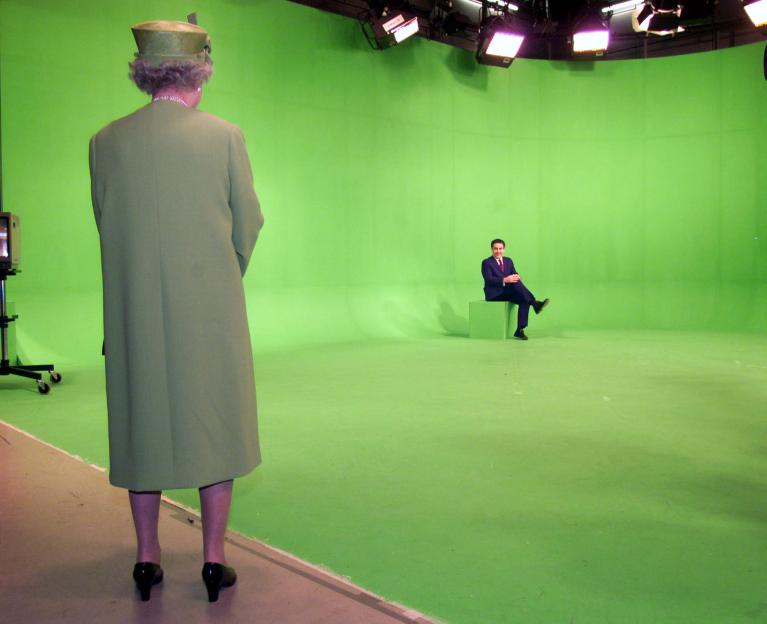 The Queen visiting a news studio's green screen set.