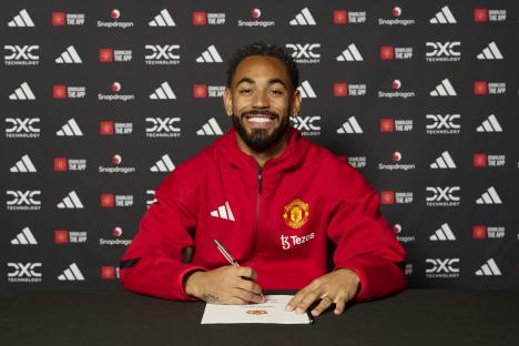 MANCHESTER, ENGLAND - JUNE 12: (EXCLUSIVE COVERAGE) Matheus Cunha of Manchester United signing his contract with the club at Carrington Training Ground on June 12, 2025 in Manchester, England. (Photo by Manchester United/Manchester United via Getty Images)