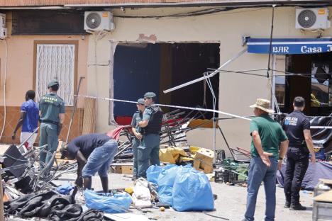 Emergency personnel at the scene of a bar explosion in San Pedro del Pinatar, Murcia, Spain.