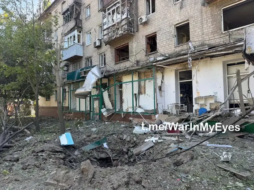 Bomb-damaged apartment building.