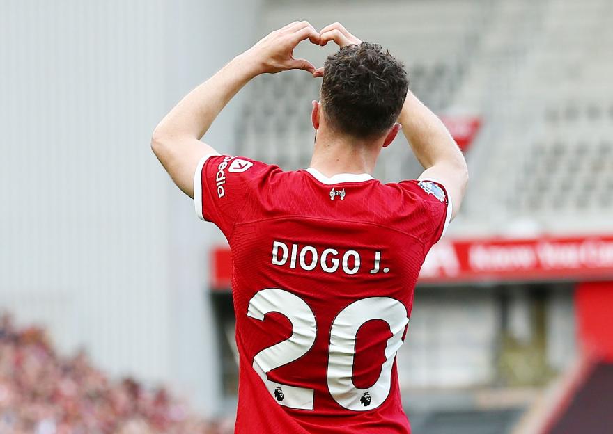 Diogo Jota of Liverpool making a heart shape with his hands.