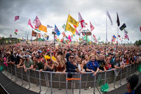 Large crowd at a music festival.