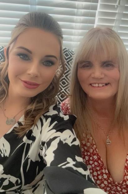 Photo of a young woman and an older woman.