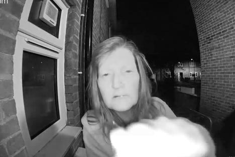 Black and white Ring doorbell camera footage of Drina Gray.