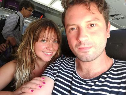 Charlotte Church and Jonathan Powell on an airplane.