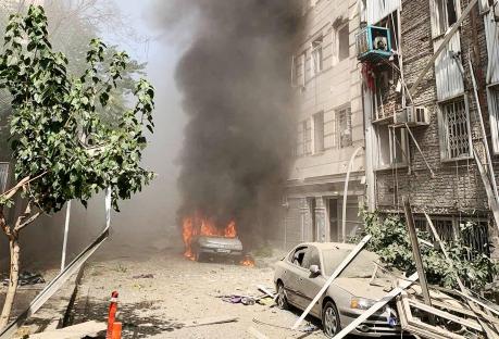 Burning cars after a bomb explosion in Tehran.